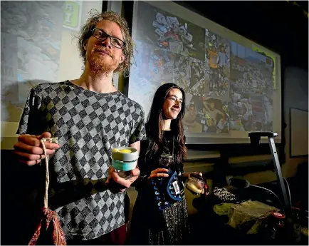  ?? PHOTO: DAVID UNWIN/STUFF ?? No-waste Nomads Liam Prince and Hannah Blumhardt on The Rubbish Trip - Living Without A Rubbish Bin, at Massey University.