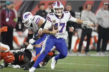  ?? ?? Buffalo Bills quarterbac­k Josh Allen runs during the second half of an NFL football game against the Cincinnati Bengals, Sunday, Nov. 5, 2023, in Cincinnati.