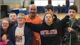  ?? FILE PHOTO ?? Coach Vince Flocco of the AMBUCS is seen in this file photo with a few of his Mighty Mites basketball players.