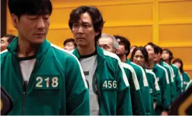  ?? Photograph: Youngkyu Park/Netflix ?? Sales of Squid Game’s signature green tracksuits and white Vans slip-ons have soared by 7,800%.
