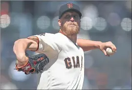  ?? BEN MARGOT — THE ASSOCIATED PRESS ?? Giants relief pitcher Will Smith worked a scoreless seventh inning in relief against the San Diego Padres on Wednesday afternoon. San Francisco won 9-4 to take the series.