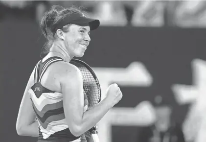  ?? ANDY WONG/AP ?? Linda Noskova celebrates Saturday after defeating Iga Swiatek in the third round of the Australian Open. Noskova won 3-6, 6-3, 6-4 to end Swiatek’s 18-match win streak.