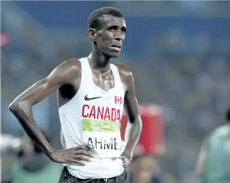  ?? FRANK GUNN/THE CANADIAN PRESS ?? Mo Ahmed of St. Catharines reacts to his fifth place finish in the 5,000-metre race at the Olympic games in Rio de Janeiro, Brazil, Saturday.