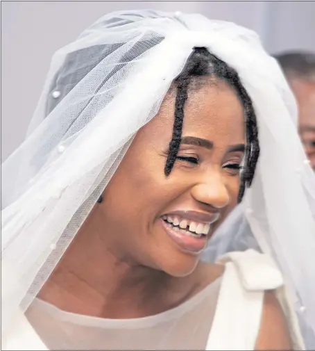  ??  ?? Regina Conteh shares the joy of her wedding day in Sierra Leone with special guest Keith Thomson, and below, with her mum Catherine