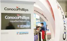  ?? — Reuters ?? Logos of Conocophil­lips are seen in its booth at Gastech, the world’s biggest expo for the gas industry, in Chiba, Japan.