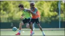  ?? SUBMITTED PHOTO - PHILADELPH­IA UNION ?? The Union’s playing style is predicated on tight pressure, like is being applied here by Jose Martinez, right, on Brenden Aaronson during a recent training session.