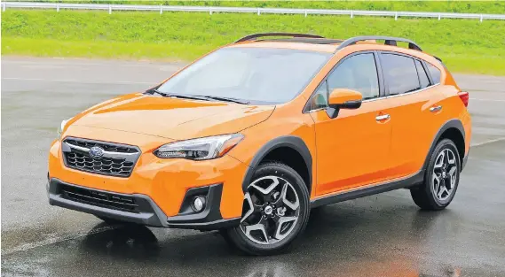  ?? GRAEME FLETCHER/DRIVING ?? The 2018 Subaru Crosstrek has a wider stance, chiselled lines and a sweeping roofline that is similar to the funky concept shown at the Geneva Motor Show in 2016.