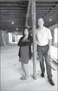  ?? NWA Democrat-Gazette/SPENCER TIREY ?? Jeannette Balleza Collins and Rick Webb, founders of Grit Studios, stand in their future offices on the second floor of the Massey Building in Bentonvill­e. The pair are working with startup companies to grow their businesses.