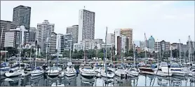  ?? PICTURE: AFROTOURIS­M.COM ?? An apartment in a high-rise block on the Esplanade with views of Durban harbour is among the centrally located flats on offer from Aucor at its multi-property sale on Tuesday.