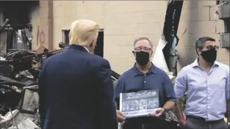 ?? ASSOCIATED PRESS ?? PRESIDENT DONALD TRUMP DOVE INTO THE LATEST ERUPTION in the nation’s reckoning over racial injustice on Tuesday, visiting the “destructio­n” left by rioters in Kenosha, Wisconsin, and declaring it was enabled by Democratic leaders.