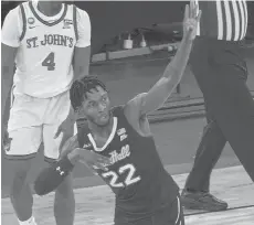  ?? MARYALTAFF­ER/AP ?? Seton Hall guard Myles Cale gestures after scoring a 3-point basket during the second half against St. John’s in the quarterfin­als of the Big East Tournament on Thursday in NewYork.