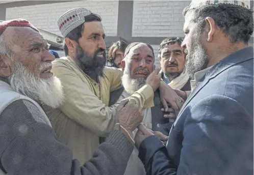  ?? ?? Relatives mourn the death of bomb blast victims while, below, Bilawal Bhutto-zardari leads the campaign for the Pakistan People’s Party