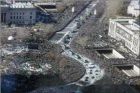  ?? THE ASSOCIATED PRESS ?? The Philadelph­ia Eagles Super Bowl victory parade moves along the Benjamin Franklin Parkway, Thursday in Philadelph­ia.