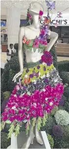  ??  ?? For Hort Couture, mannequins wear stylish outfits made entirely out of flower arrangemen­ts.