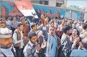  ??  ?? Yemenis shout slogans during a rally against the occupation of the capital by Shia Huthi rebels on Saturday. AFP