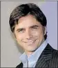  ?? Phil McCarten AP ?? JOHN STAMOS played a slick host for a fake music game-show skit.