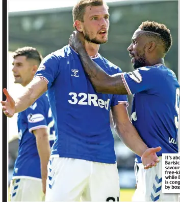  ??  ?? It’s about time: Barisic (left) savours his superb free-kick winner while Bayo (right) is congratula­ted by boss Lennon