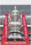  ??  ?? The FA Cup trophy at Wembley Stadium.