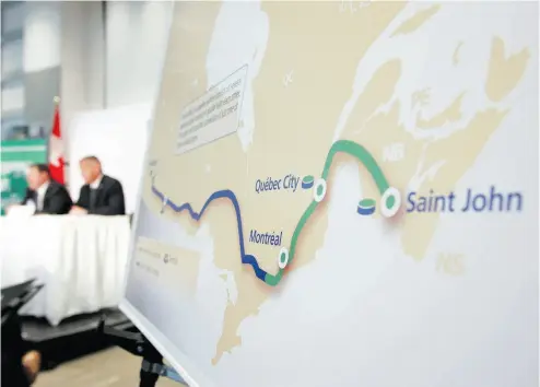  ?? GAVIN YOUNG / POSTMEDIA NEWS FILES ?? TransCanad­a executives announce the Energy East pipeline project in 2013. A reader suggests NEB guidelines should be amended so that the Energy East pipeline can be built in a timely fashion.