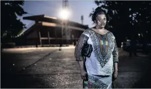  ??  ?? Outside the national stadium where security force members raped her. “I was raped behind the stadium. Since then I can’t understand my life. I was breastfeed­ing and my husband abandoned me. My children can’t go to school and I can’t pay my rent.” –...