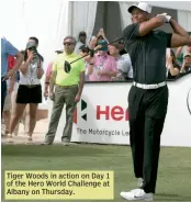  ??  ?? Tiger Woods in action on Day 1 of the Hero World Challenge at Albany on Thursday.