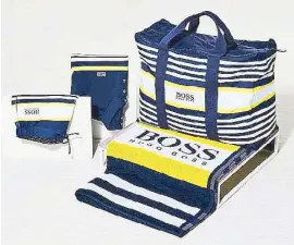  ??  ?? Look cool by the pool: Schooling’s limited-edition capsule collection for Boss includes a polo shirt, T-shirt, shorts, bag and beach towel.