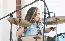  ??  ?? Addisyn Bonadonna, 10, behind the kit for Leave Those Kids Alone.