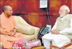  ?? PT ?? Prime Minister Narendra Modi with Uttar Pradesh chief minister Yogi Adityanath in New Delhi, March 21. The ascent of the UP chief minister is a challenge for both the BJP and the opposition