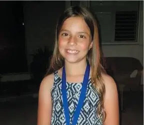  ?? TORONTO POLICE HANDOUT PHOTO ?? This undated photo provided by the Toronto Police shows 10-year-old Julianna Kozis, who was killed in a mass shooting in Toronto on Sunday.