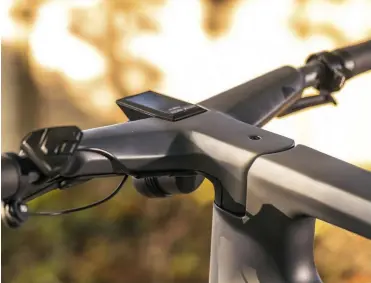  ??  ?? Ortlieb’s compatible rear rack mounts into the stays
A belt drive is far more easy to maintain than a chain
The Kiox display is tidily integrated into the bar
The rear aluminium mudguard has a built-in light