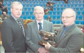  ?? (Pic: O’Gorman Photograph­y) ?? FLASHBACK TO 2011: The late Pat McHugh, (centre) the longest serving mart manager in Europe with 46 year’s service pictured receiving a presentati­on on his final day as manager in Corrin Mart, Fermoy from Sean O’Sullivan (Chief Executive, Cork Marts - left) and Oliver Manley (Cork Marts board member).