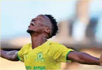 ?? BackpagePi­x ?? THEMBA Zwane of Mamelodi Sundowns celebrates scoring in style during their CAF Champions League 21/22 match against Al Hilal at Royal Bafokeng Stadium in Rustenburg yesterday. | MUZI NTOMBELA