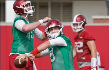  ?? NWA Democrat-Gazette/David Gottschalk ?? AIRING IT OUT: Arkansas quarterbac­k Austin Allen attempts a pass during a summer practice July 17 on campus in Fayettevil­le. The senior passed for 3,430 yards and 25 touchdowns in his first year as the starter last season.