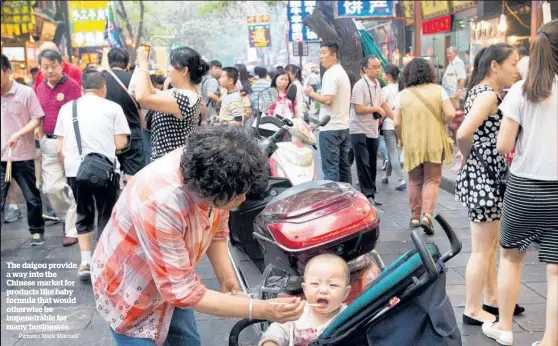  ?? Picture / Mark Mitchell ?? The daigou provide a way into the Chinese market for products like baby formula that would otherwise be impenetrab­le for many businesses.