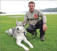  ??  ?? Koda and Wayne take a breather as they move through Argyll, picking litter along the way.