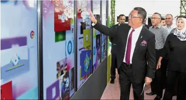  ??  ?? Pre-opening tour: Abdul Rahman touring the expo venue during the media preview at Dataran Merdeka in Kuala Lumpur.