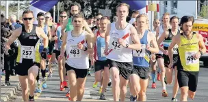  ?? Photo by Mark Easton ?? n POPULAR EVENT: Runners set off at the Hillingdon Half Marathon