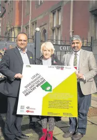  ??  ?? From left, county councillor Azhar Ali, cabinet member for health and wellbeing, Lorraine Beavers, lead member for health, and Dr Sakthi Karunanith­i, Lancashire County Council’s director of public health
