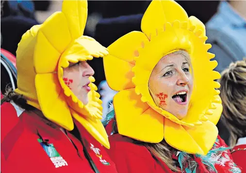  ??  ?? Welsh fans have adopted Sir Tom Jones’s classic as an unofficial national anthem