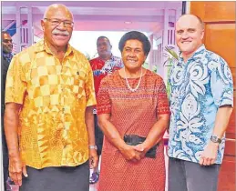  ?? Picture: FIJI GOVERNEMEN­T ?? Prime Minister Sitiveni Rabuka, left, with wife Sulueti and Australia’s Chargé D’Affaires to Fiji John Williams during a reception marking Australia Day on Friday night.