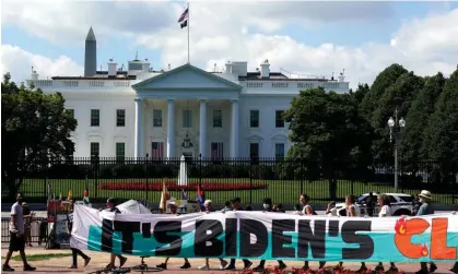  ?? Photograph: Yuri Gripas/AP ?? Climate activists rally in front of the White House to demand that Joe Biden declare a climate emergency and move the country rapidly away from fossil fuels on 4 July 2023.