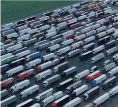  ?? GETTY ?? Backlog: Some of the lorries parked on the runway at Manston airport in Kent yesterday waiting to cross the English Channel