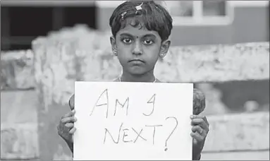  ??  ?? A girl in Kochi, in the south-western state of Kerala, protests against the rape in Kathua, near Jammu, northern India.
(Photo: Reuters)