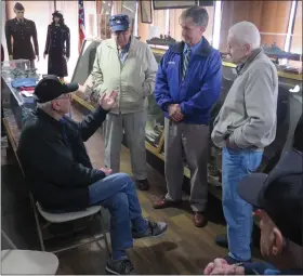  ?? DAVID MEKEEL — READING EAGLE ?? World War II veterans, from left, Mathias Gutman, Lou Cinfici, Joe Zebertavag­e and Charlie Brooking, chat with state Rep. Mark Gillen at the Berks County Military History Museum.