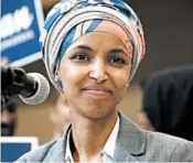  ?? EMILIE RICHARDSON/BLOOMBERG ?? Rep.-elect Ilhan Omar wears a headscarf that could fall afoul of the House ban on headwear on the chamber floor.