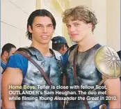  ??  ?? Home Boys: Telfer is close with fellow Scot, OUTLANDER’S Sam Heughan. The duo met while filming Young Alexander the Great in 2010.