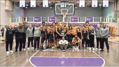  ?? Kennesaw state university athletics ?? Kennesaw State Owls players and coaches pose with the 2023 Atlantic Sun Conference Basketball trophy after defeating Central Arkansas.