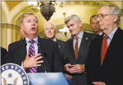  ?? ALEX BRANDON — THE ASSOCIATED PRESS ?? Sen. Lindsey Graham, R-S.C., left, speaks to the media Tuesday, accompanie­d by Senate Majority Whip Sen. John Cornyn, R-Texas, Sen. Bill Cassidy, R-La., Sen. John Thune, R-S.D., and Senate Majority Leader Mitch McConnell of Kentucky, on Capitol Hill in...