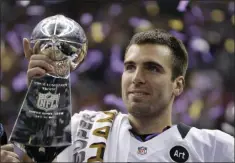  ?? MATT SLOCUM - THE ASSOCIATED PRESS ?? FILE - In this Feb. 13, 2013 file photo, Baltimore Ravens quarterbac­k Joe Flacco (5) holds the Vince Lombardi Trophy after defeating the San Francisco 49ers 34-31 in the NFL Super Bowl XLVII football game in New Orleans.