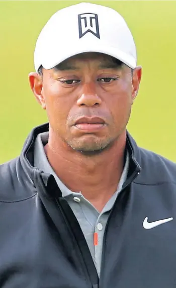  ??  ?? ON MEND: Tiger Woods has a long road ahead to recover from his car crash injuries.